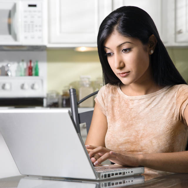 A woman using a laptop